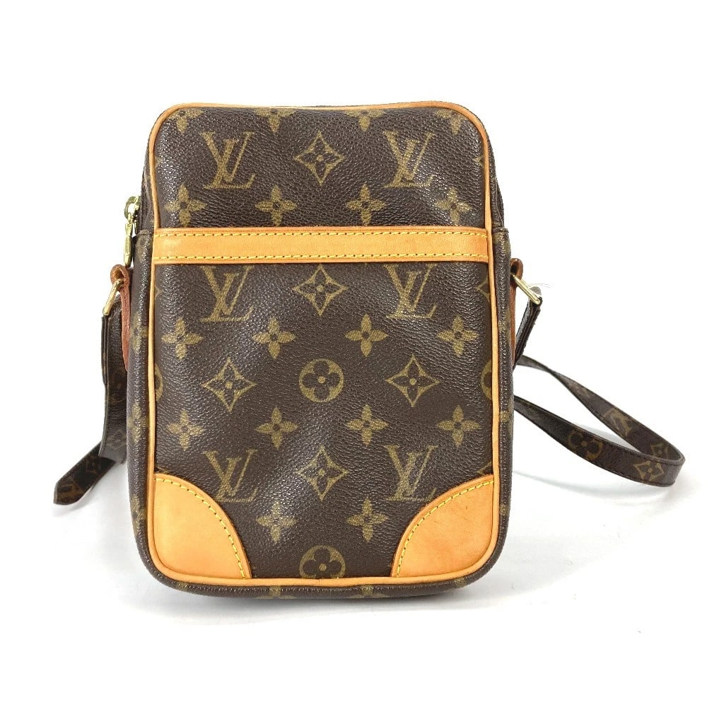 LOUIS VUITTON MONOGRAM DANUBE CROSSBODY POCHETTE BAG: LOUIS VUITTON Monogram Danube Crossbody Pochette bag Brand: LOUIS VUITTON Type/Style: Shoulder Bag Material: MonogramCanvas Color: Brown Size: W5.7xH8.3xD1.8inch / W14.5cmxH21cmxD4.5cm Accessories
