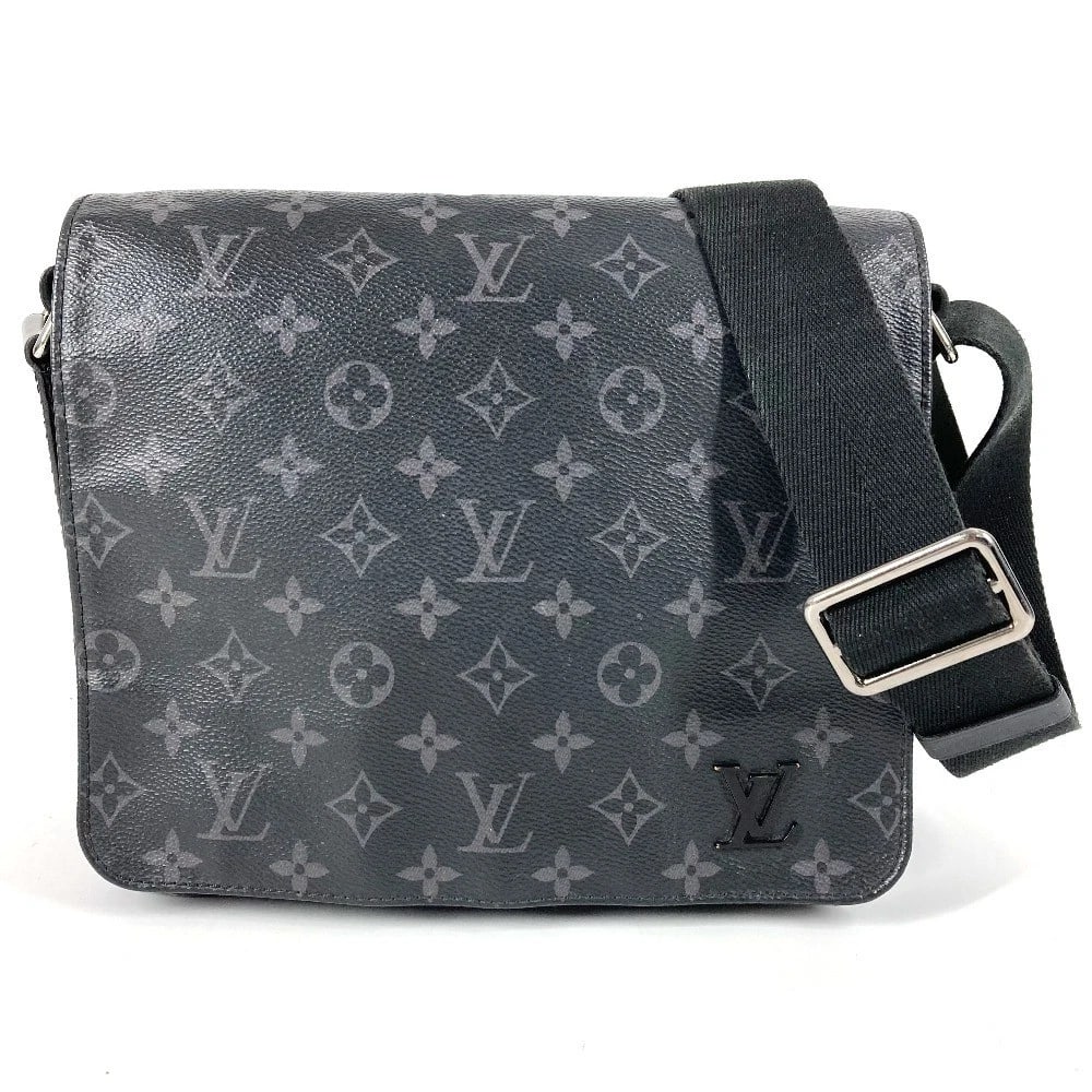 LOUIS VUITTON MONOGRAMECLIPSE DISTRICT MESSENGER BAG: LOUIS VUITTON MonogramEclipse District Messenger Bag Brand: Louis Vuitton Type/Style: Shoulder Bag Material: MonogramEclipseCanvas Color: Black Size: W9.6xH7.7xD2.6inch / W24.5cmxH19.5cmxD6.5cm Ac