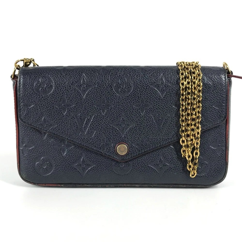 LOUIS VUITTON MONOGRAMEMPREINTE POCHETTE: LOUIS VUITTON MonogramEmpreinte Pochette Brand: LOUIS VUITTON Type/Style: Shoulder Bag Material: MonogramEmpreinteLeather Color: Navy Size: W8.5xH4.7inch / W21.5cmxH12cm Accessories: None Accessories