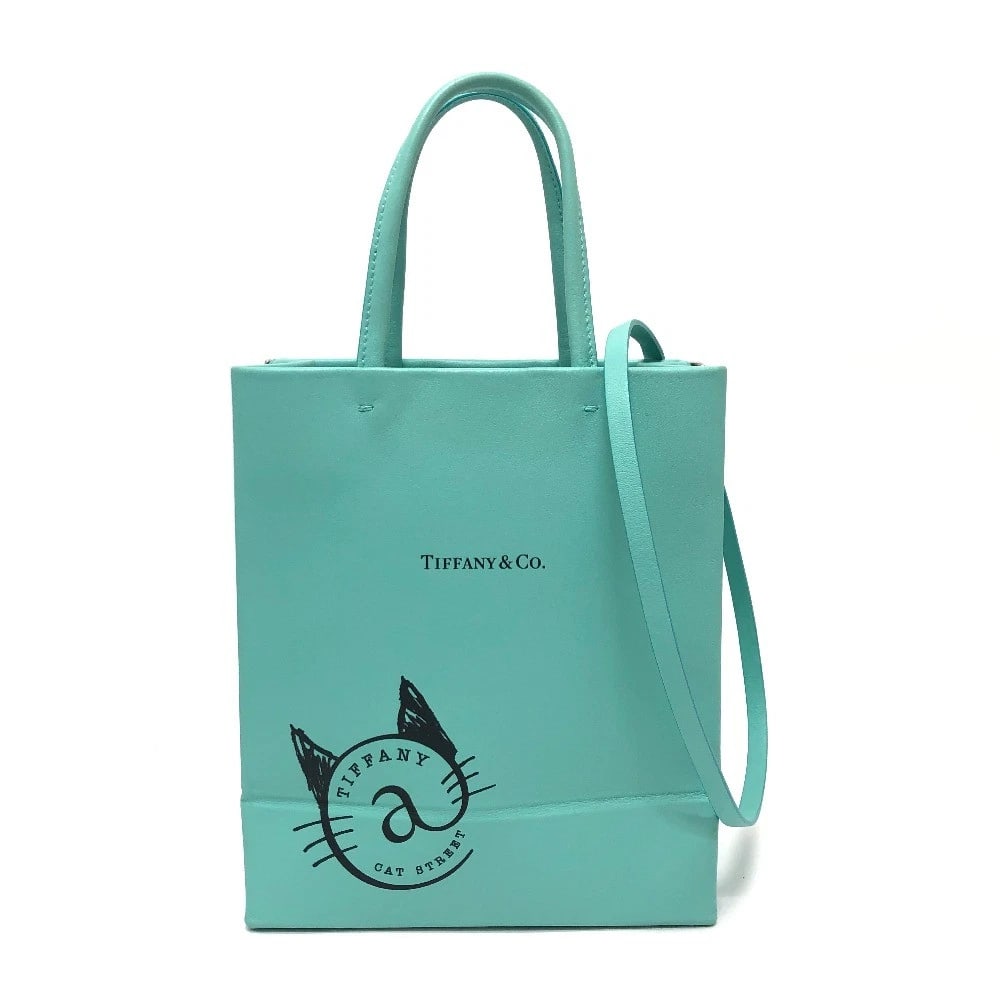 TIFFANY&CO. CAT STREET SMALL SHOPPING TOTE 2WAY HAND BAG: TIFFANY&Co. Cat street Small Shopping Tote 2WAY Hand Bag Brand: TIFFANY&Co. Type/Style: Shoulder Bag Material: Leather Color: bluexSilverHardware Size: W6.9xH8.3xD3.9inch / W17.5cmxH21cmxD10cm