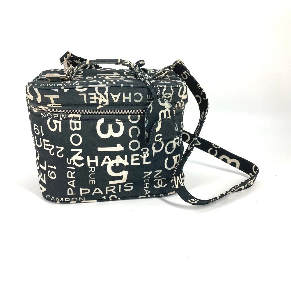 CHANEL VANITY BAG 2WAY SHOULDER BAG HAND BAG: CHANEL Vanity bag 2WAY Shoulder Bag Hand Bag Brand: CHANEL Type/Style: Hand Bag Material: Canvas Color: BlackxWhite Size: W9.3xH7.5xD5.9inch / W23.5cmxH19cmxD15cm Accessories: None Accessories