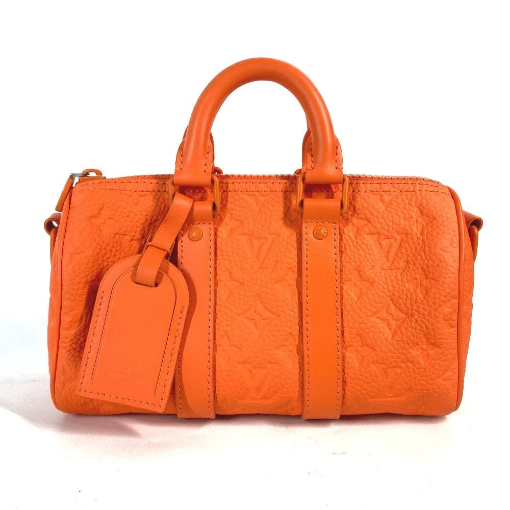 LOUIS VUITTON MONOGRAM KEEPALL BANDOULIERE25 BAG HAND BAG: LOUIS VUITTON Monogram Keepall Bandouliere25 Bag Hand Bag Brand: LOUIS VUITTON Type/Style: Hand Bag Material: Taurillon ClemenceLeather Color: Orange Size: W10.0xH5.9xD3.7inch / W25.5cmxH15cmxD9.5cm
