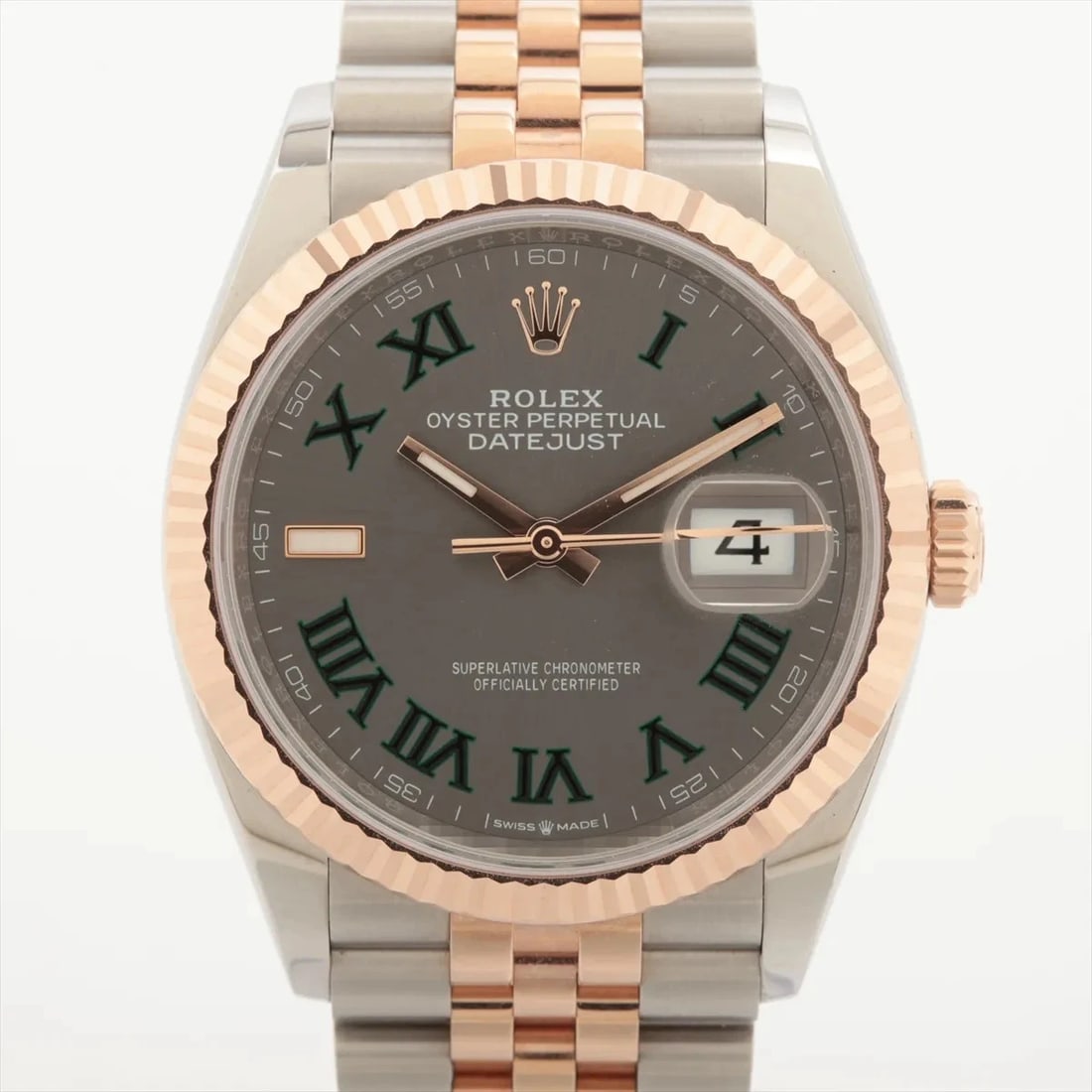 ROLEX DATEJUST PG?SS SLATE: Rolex DATEJUST PG?SS Slate Brand: Rolex Type/Style: Wristwatch Material: PG?SS Color: Dial Color slate Size: Case:W1.2 x H1.2inch / W36 x H36 Circumference of Wrist:6.5inch / 16.5 Accessories: None