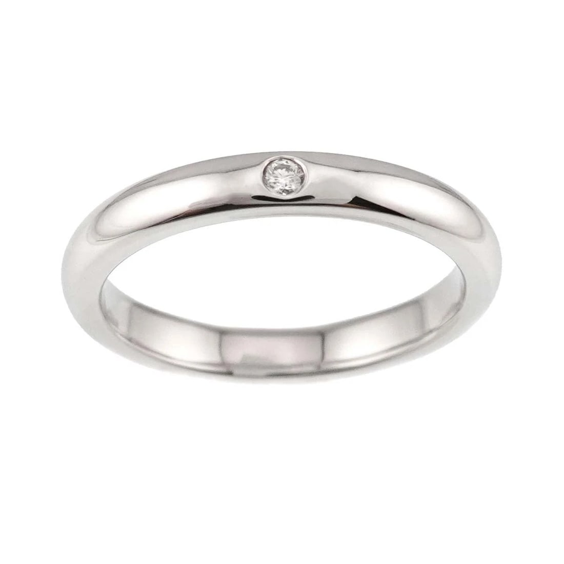 TIFFANY & CO. STACKING BAND RING WITH SINGLE DIAMOND: Tiffany & Co. Stacking Band Ring with Single Diamond Brand: Tiffany & Co. Type/Style: Ring Material: PT950, Main Stone Natural Color: Silver Size: US 6 Accessories: None Accessories Notice: When