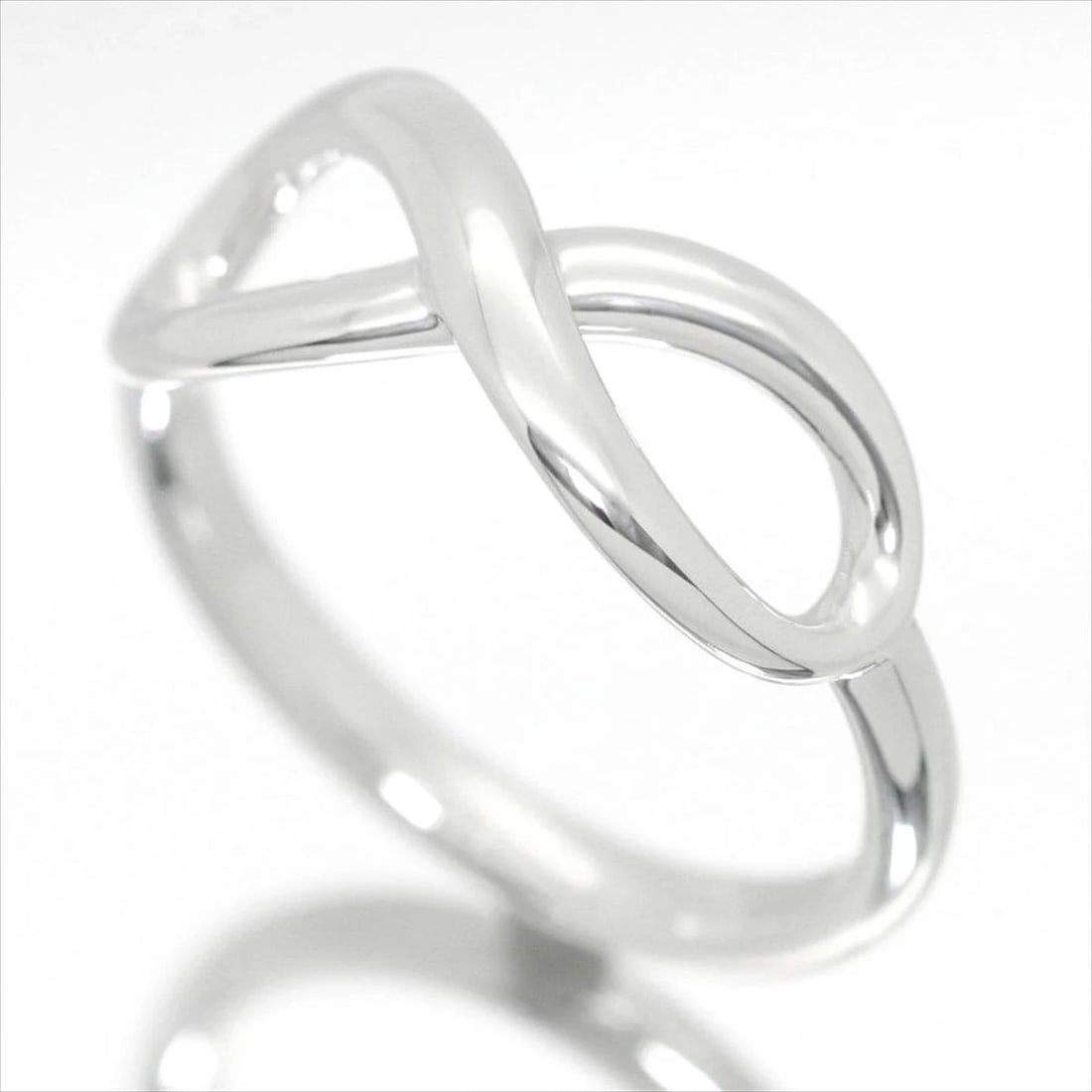 TIFFANY & CO. INFINITY SILVER RING AG925: Tiffany & Co. Infinity Silver Ring Ag925 Brand: Tiffany & Co. Type/Style: Ring Material: Sterling Silver (Ag925), Color: Silver Size: US 3 Accessories: None Accessories Notice: When purchasing