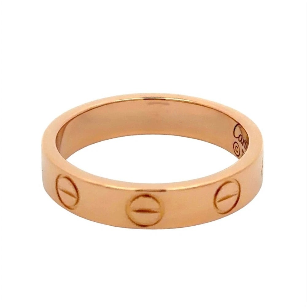CARTIER MINI LOVE RING PINK GOLD 18K: Cartier Mini Love Ring Pink Gold 18K Brand: Cartier Type/Style: Ring Material: 18K Pink Gold, Color: Pink Gold Size: US 4 Accessories: None Accessories Notice: When purchasing pre-owned goods, please