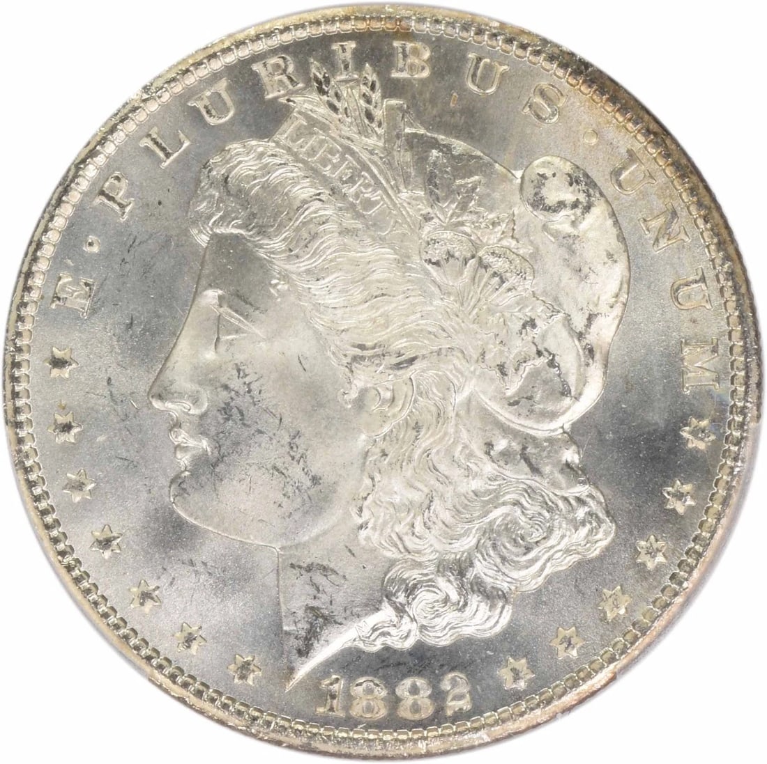 1882-CC MORGAN SILVER DOLLAR: 1882-CC Morgan Silver Dollar Year: 1882 Composition: 90% Silver, 10% Copper Denomination: $1 Country of Origin: United States Accessories: None Accessories Notice: When purchasing pre-owned goods,