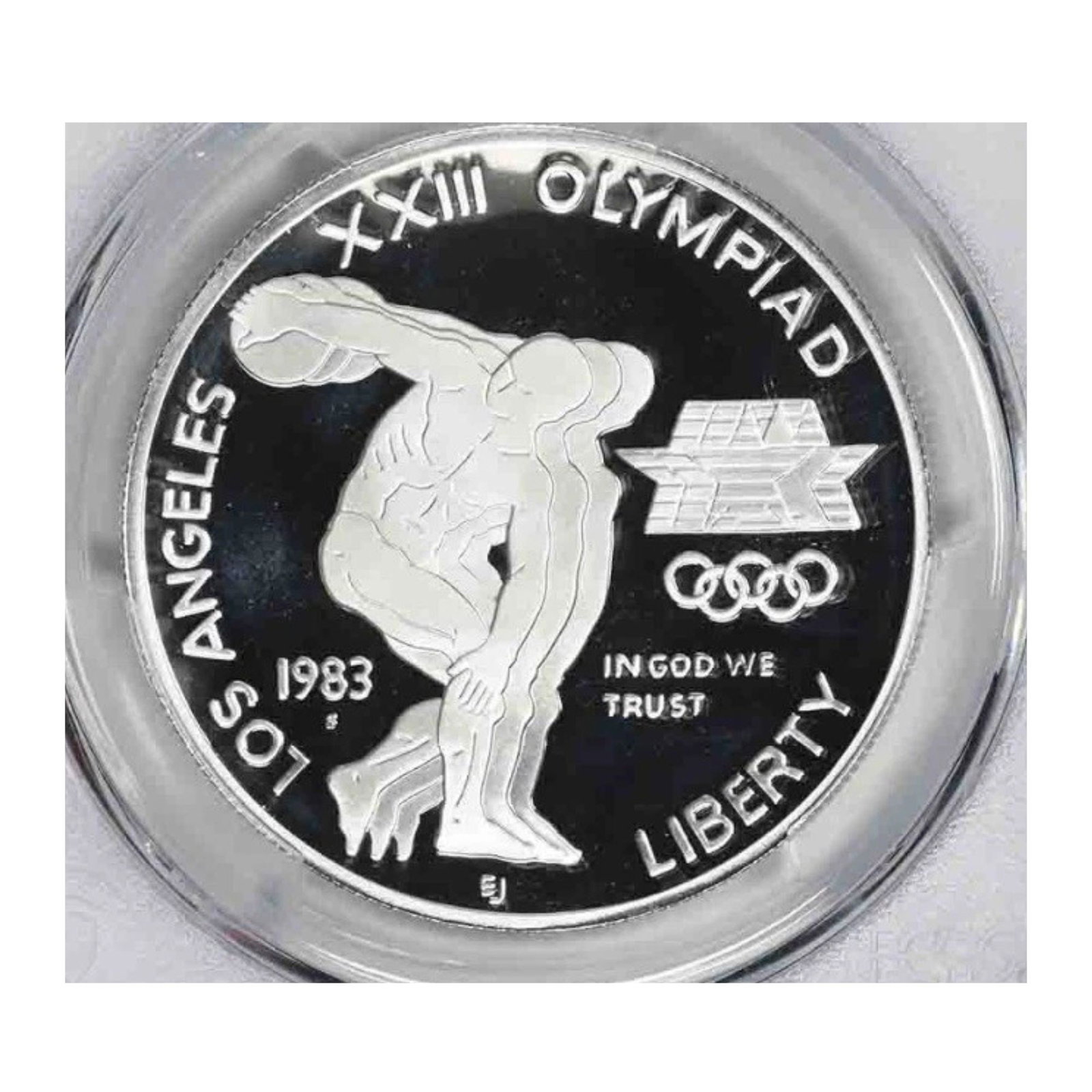 1983-S OLYMPIC SILVER COMMEMORATIVE DOLLAR: 1983-S Olympic Silver Commemorative Dollar Year: 1983 Composition: Silver Denomination: Dollar Country of Origin: United States Accessories: None Accessories Notice: When purchasing pre-owned goods,