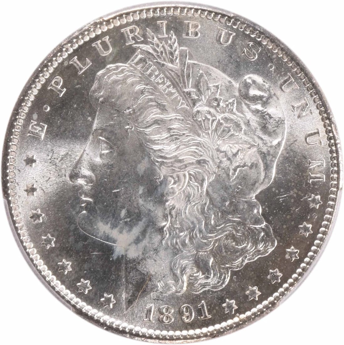 1891-S MORGAN SILVER DOLLAR: 1891-S Morgan Silver Dollar Year: 1891 Composition: 90% Silver, 10% Copper Denomination: $1 Country of Origin: United States Accessories: None Accessories Notice: When purchasing pre-owned goods, p