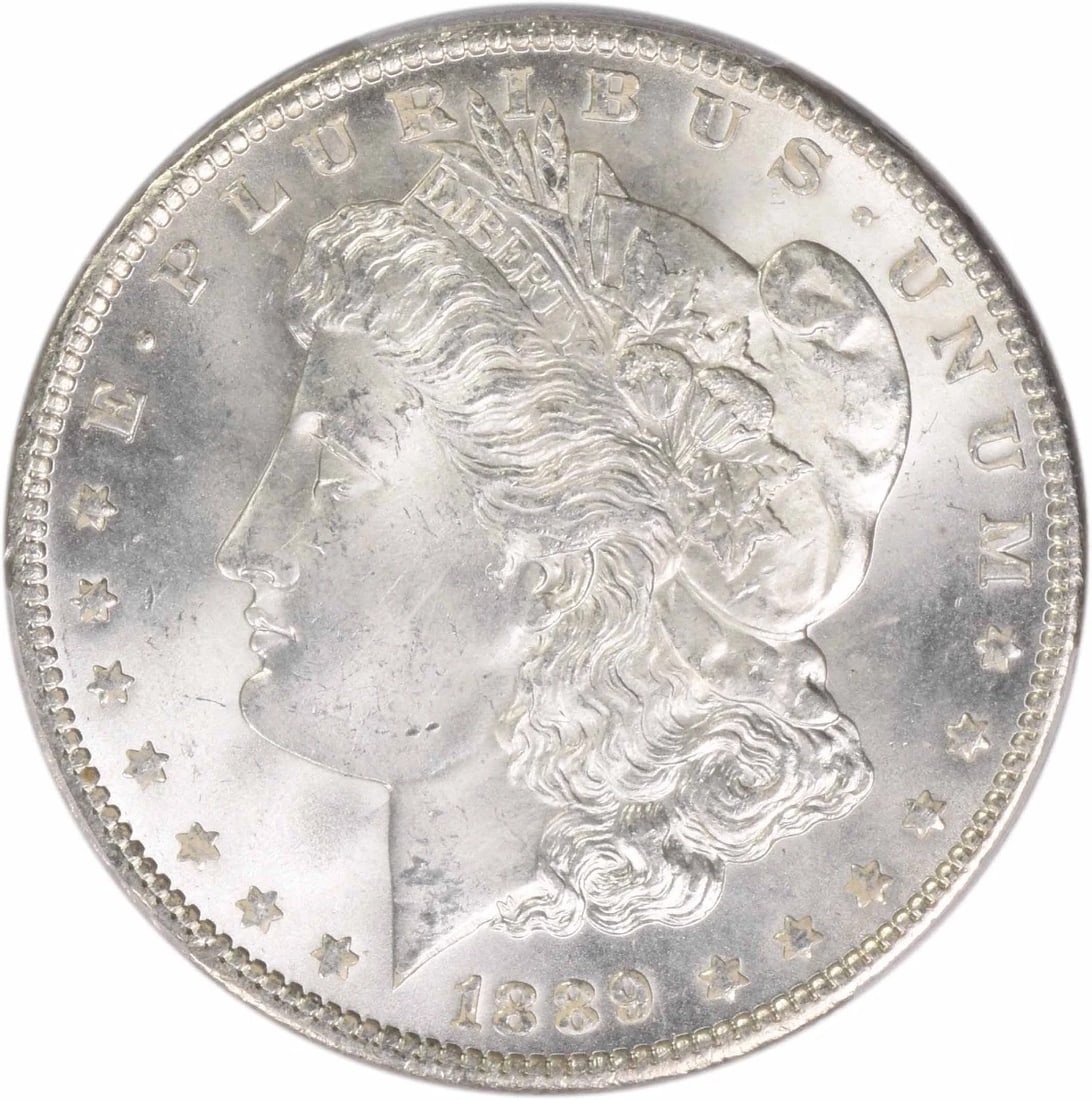 1889 MORGAN SILVER DOLLAR: 1889 Morgan Silver Dollar Year: 1889 Composition: 90% Silver, 10% Copper Denomination: $1 Country of Origin: United States Accessories: None Accessories Notice: When purchasing pre-owned goods,