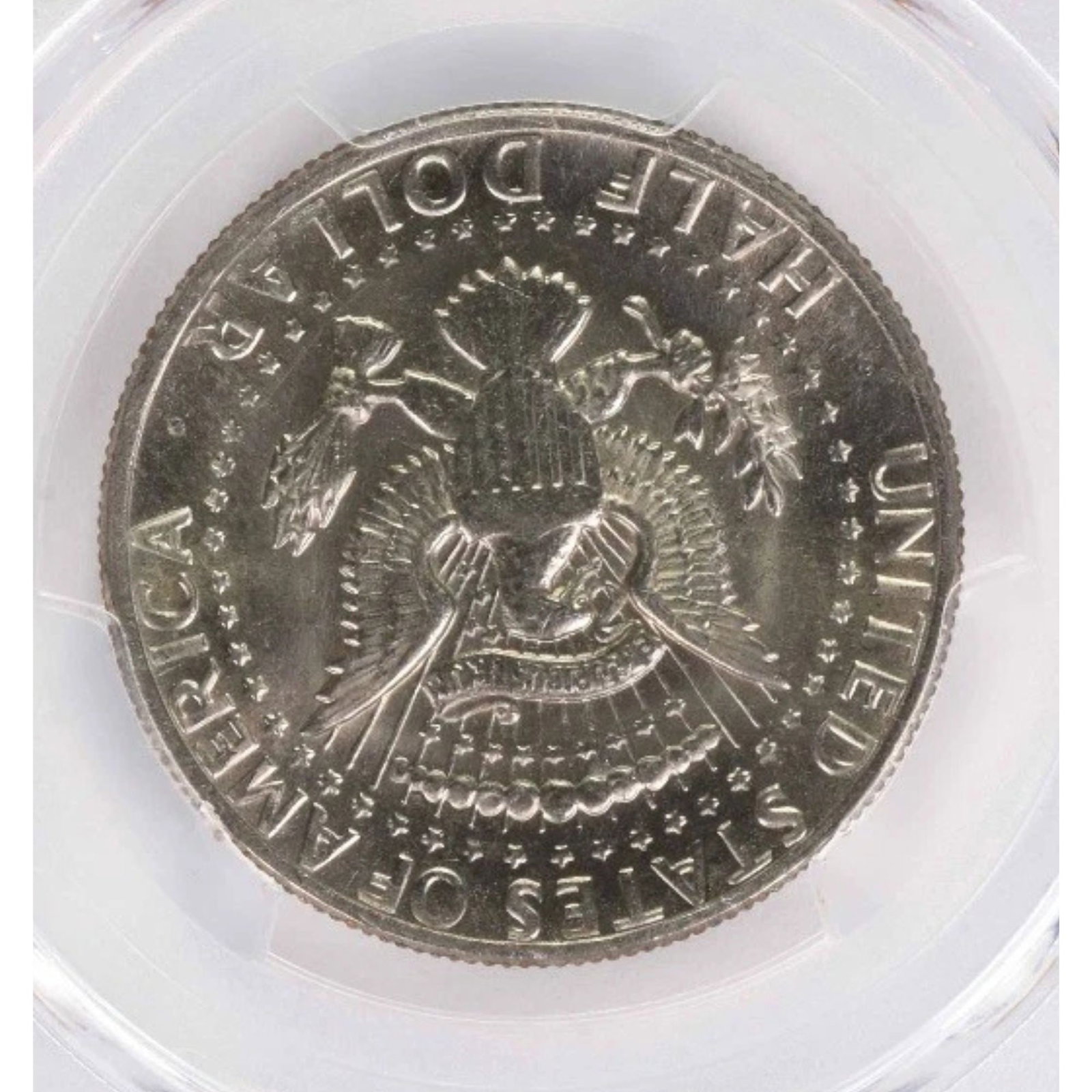 1977-D KENNEDY HALF DOLLAR: 1977-D Kennedy Half Dollar Year: 1977 Composition: Clad Denomination: 50C Country of Origin: United States Accessories: None Accessories Notice: When purchasing pre-owned goods, please refer to the