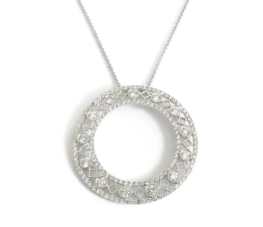 ITALIAN DIAMOND CIRCLE PENDANT NECKLACE IN 18K WHITE GOLD: Italian Diamond Circle Pendant Necklace in 18K White Gold Brand: Unbranded Type/Style: Necklace Material: 18K White Gold, Main Stone Natural Color: White Size: Length: 16 inches Pendant: 1.125 inches 