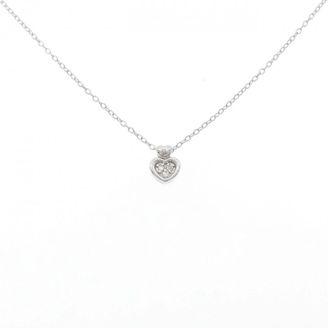 K18WG/PT850 HEART DIAMOND NECKLACE: K18WG/PT850 Heart Diamond Necklace Brand: Unbranded Type/Style: Diamond Necklace Material: K18WG/PT850 Color: WG PT Size: Actual Size Pendant length approx. x width approx.: 7.6mmx6.2mm Chain maximum