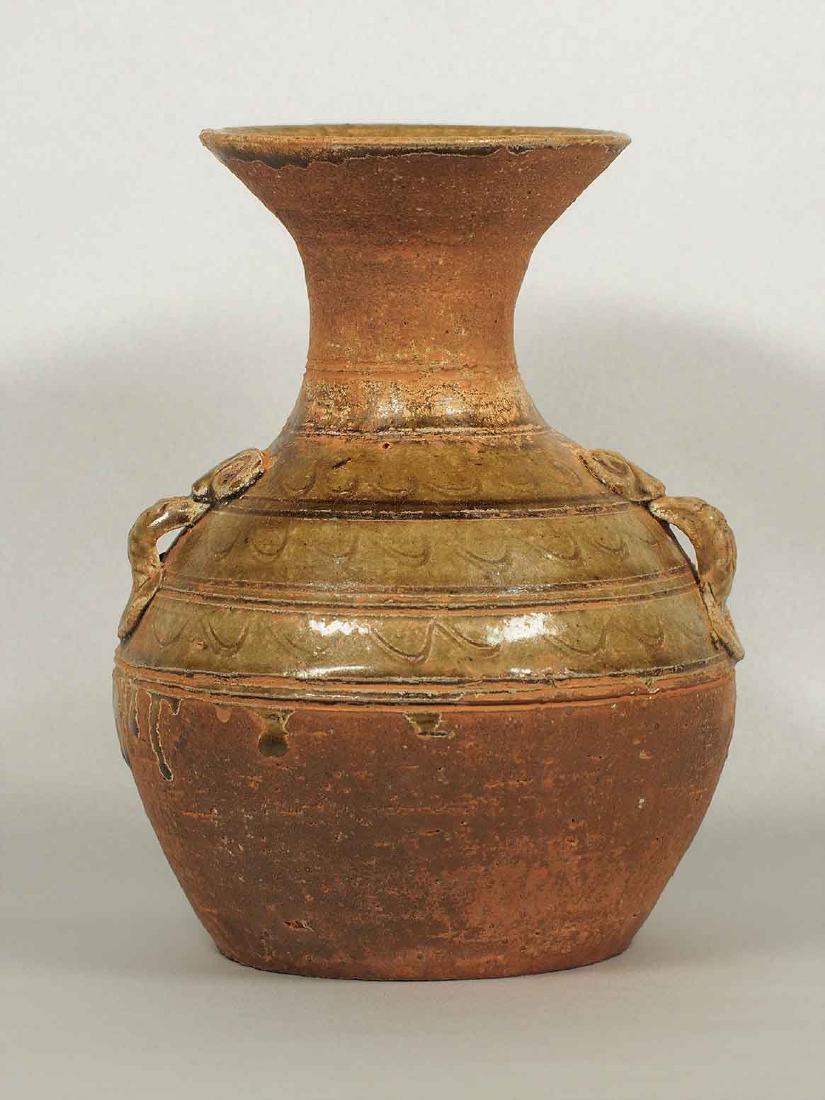 Proto-Porcelain Hu-form Jar, early Han Dynasty: Rare and iconic proto-porcelain Hu-form jar with incised design. Height 190mm, 7-1/2"inch. 1st BC.