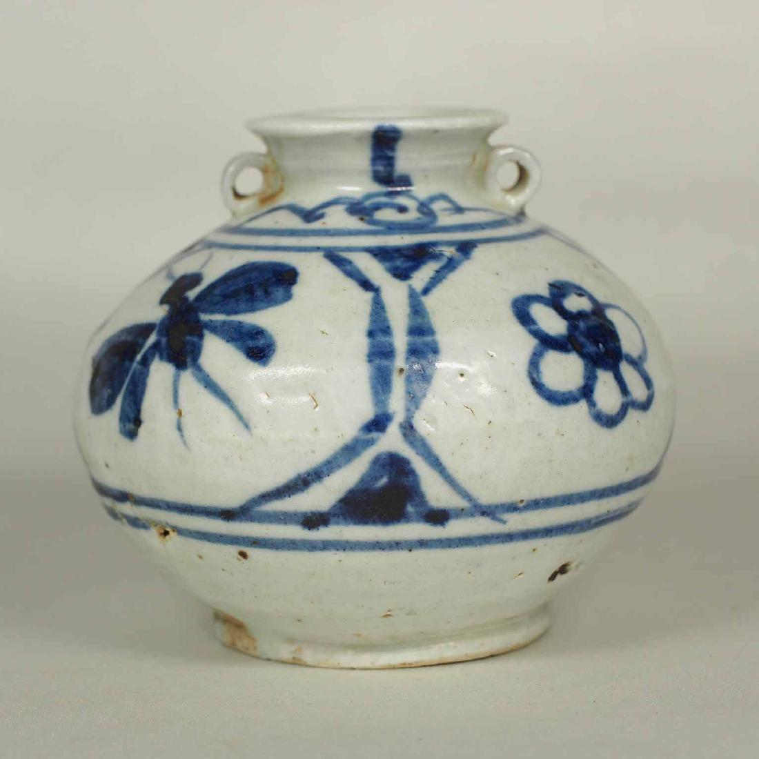 Jarlet with Bug and Flower, Annamese: Good underglaze blue jarlet with bug and flower design and two ring lugs on the side. Diameter 75mm, 3"inch. 16th century.