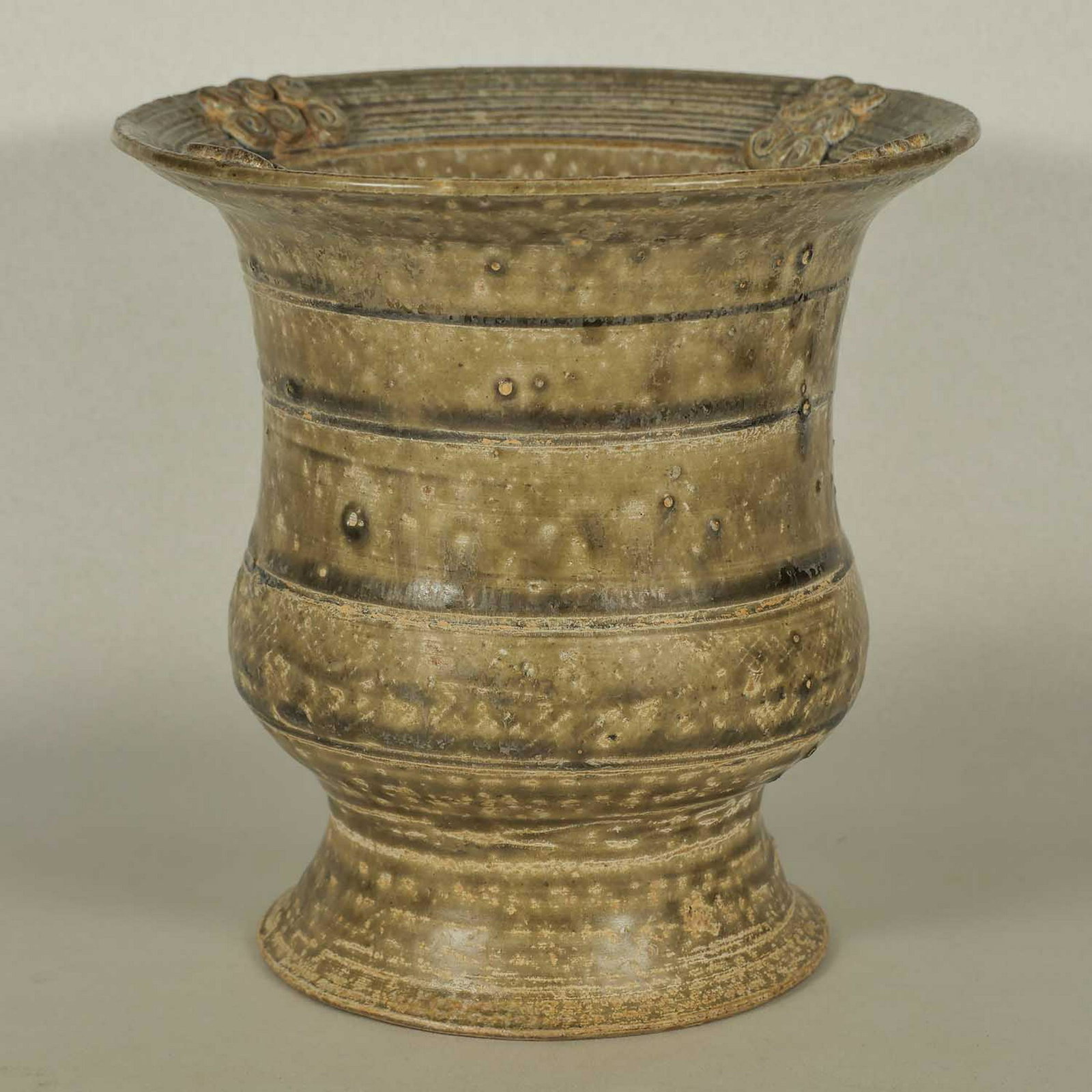 Yue Spittoon, Warring States: Very rare and unique Yue spittoon with S-shape ornaments. Beautiful obvious calcification and splitted crackles as definitive signs of oldness. Height 156mm, 6-1/6"inch
