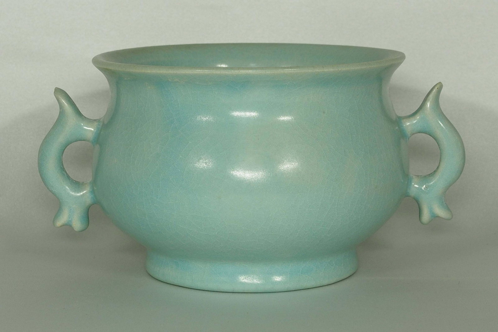 Censer with Handle, Chai Mark, Late Five Dyn-Song: Exceedingly rare and beautifully shaped bluish green legendary Chai yao censer with handle. Underneath has spurs and Chai mark. Length 160mm, 6-1/3"inch