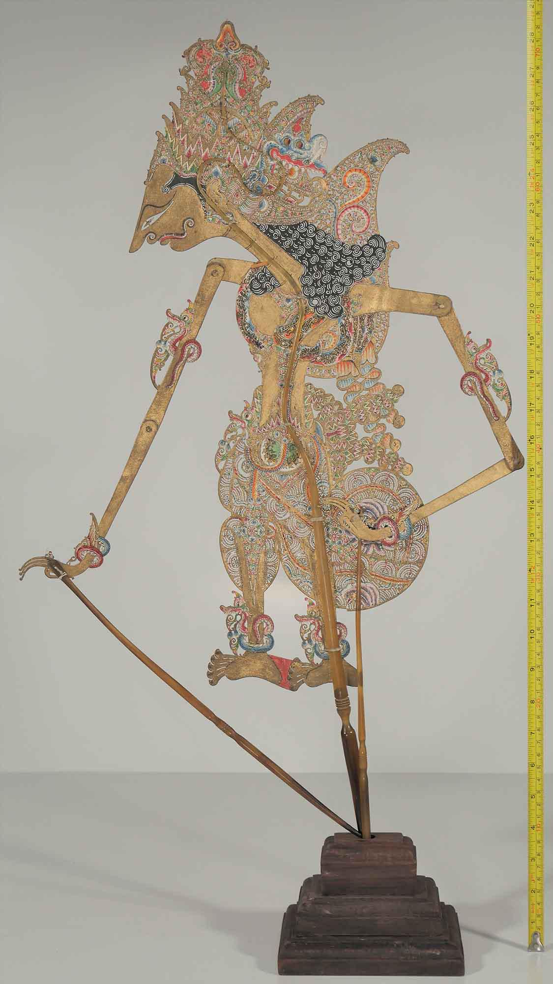 Puppet-Shadow 'Kresna', Jogja Java mid 20th C: Fine and beautiful puppet shadow/wayang kulit 'Kresna' made from carved buffalo hide and buffalo horn as its stick. Obtained from the royal family, so, don't missed out this opportunity! Height +/-660
