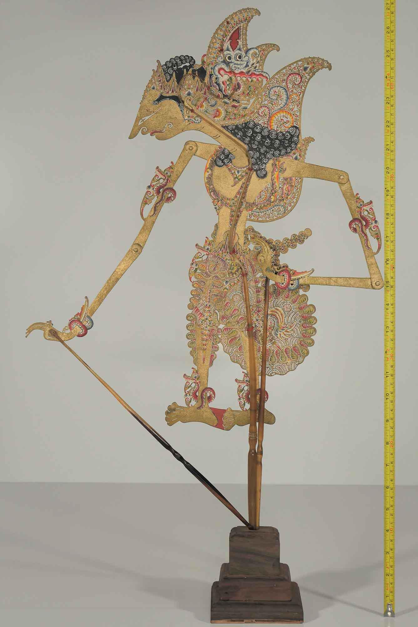 Puppet-Shadow 'Young Rama', Jogja Java mid 20th C: Fine and beautiful puppet shadow/wayang kulit 'Young Rama' made from carved buffalo hide and buffalo horn as its stick. Obtained from the royal family, so, don't missed out this opportunity! Height +/