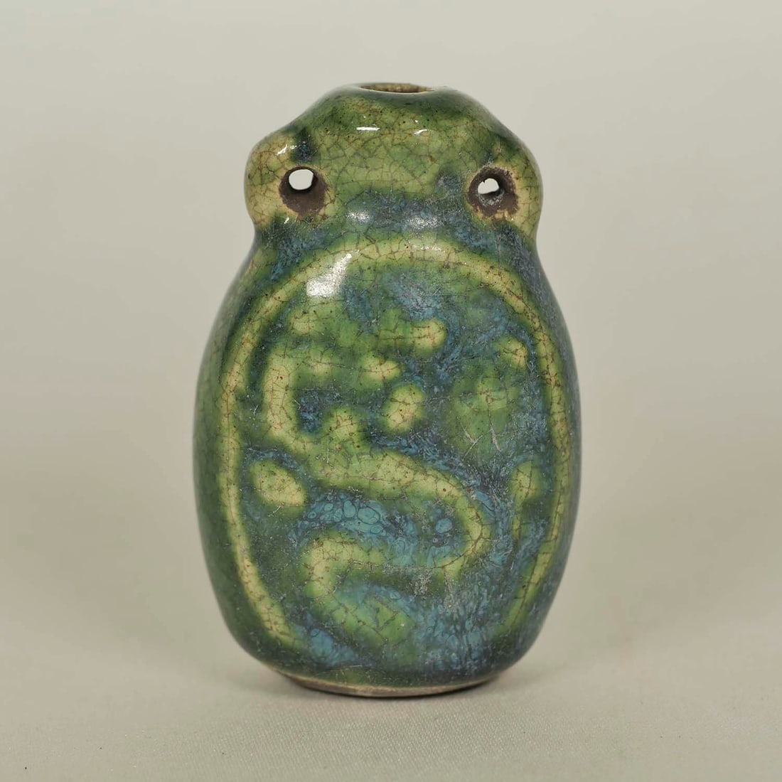 Longquan Perfume Bottle, Late Ming: Unique and rare blueish emerald green Longquan perfume bottle with carved dragon motif. Height 46mm, 1-4/5"inch