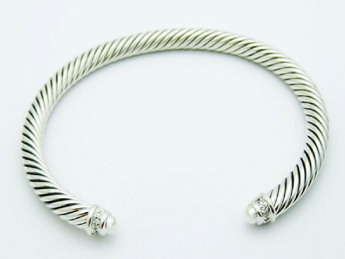 David Yurman 925 Silver Bracelet Pave Diamonds: David Yurman 925 Silver Bracelet Pave Diamonds David Yurman 925 Sterling Silver Cable Classics 5mm Bracelet with Pave 0.07tcw Diamonds This piece bares full DY. hallmarks. Retail Price: $595 Details: 