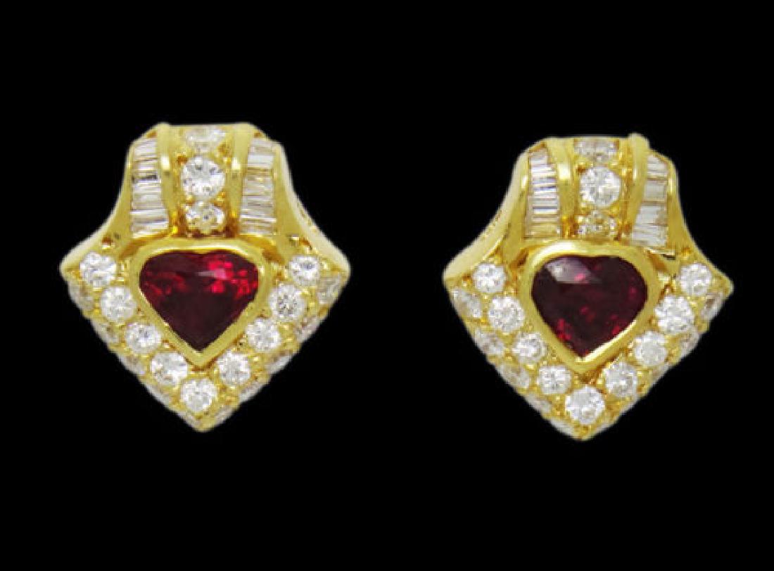 Boom 18k 3.50TCW Natural Pigeon Red Heart Ruby & VS D-E: Boom 18k Yellow Gold 3.50TCW Natural Pigeon Red Heart Ruby & VS D-E Diamond Earrings:Precious Metal Type: 18K Yellow Gold:Ruby: Natural Pigeon, Heart Shaped, approx. 2TCW, 7.1 x 7.2mm (each):Diamonds: