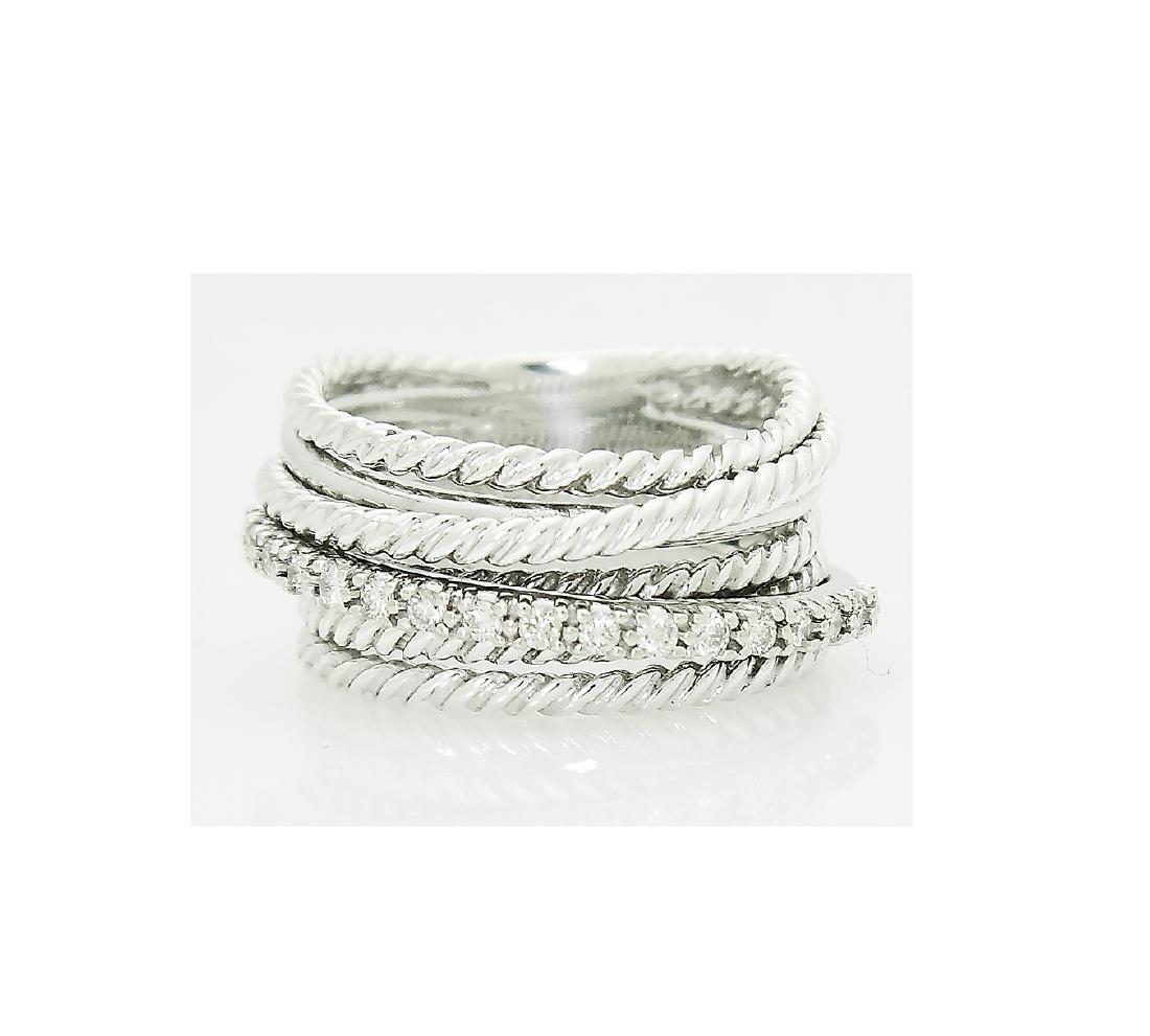 David Yurman 925 Sterling Silver Crossover Diamond Ring: David Yurman 925 Sterling Silver Crossover Diamond Ring Sz 7.5 Retail price: $850 Brand: David Yurman Material: 925 Sterling Silver Diamond: 0.18TCW Width: 11mm. Size: 7.5 Condition: Like New Comes wi