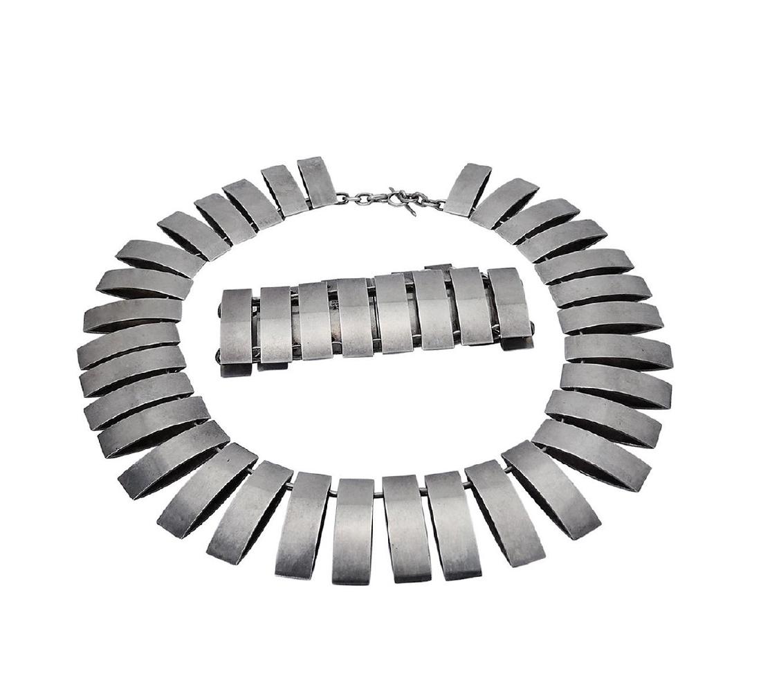 Georg Jensen Sterling Silver Bracelet & Necklace Set: Georg Jensen Sterling Silver Bracelet & Necklace Set By Arno Malinowski Bracelet: 7" long, weighs 52.1 grams, 27mm wide Necklace: 13.75" long, weighs 96.2 grams, 27mm wide Condition: Very Good