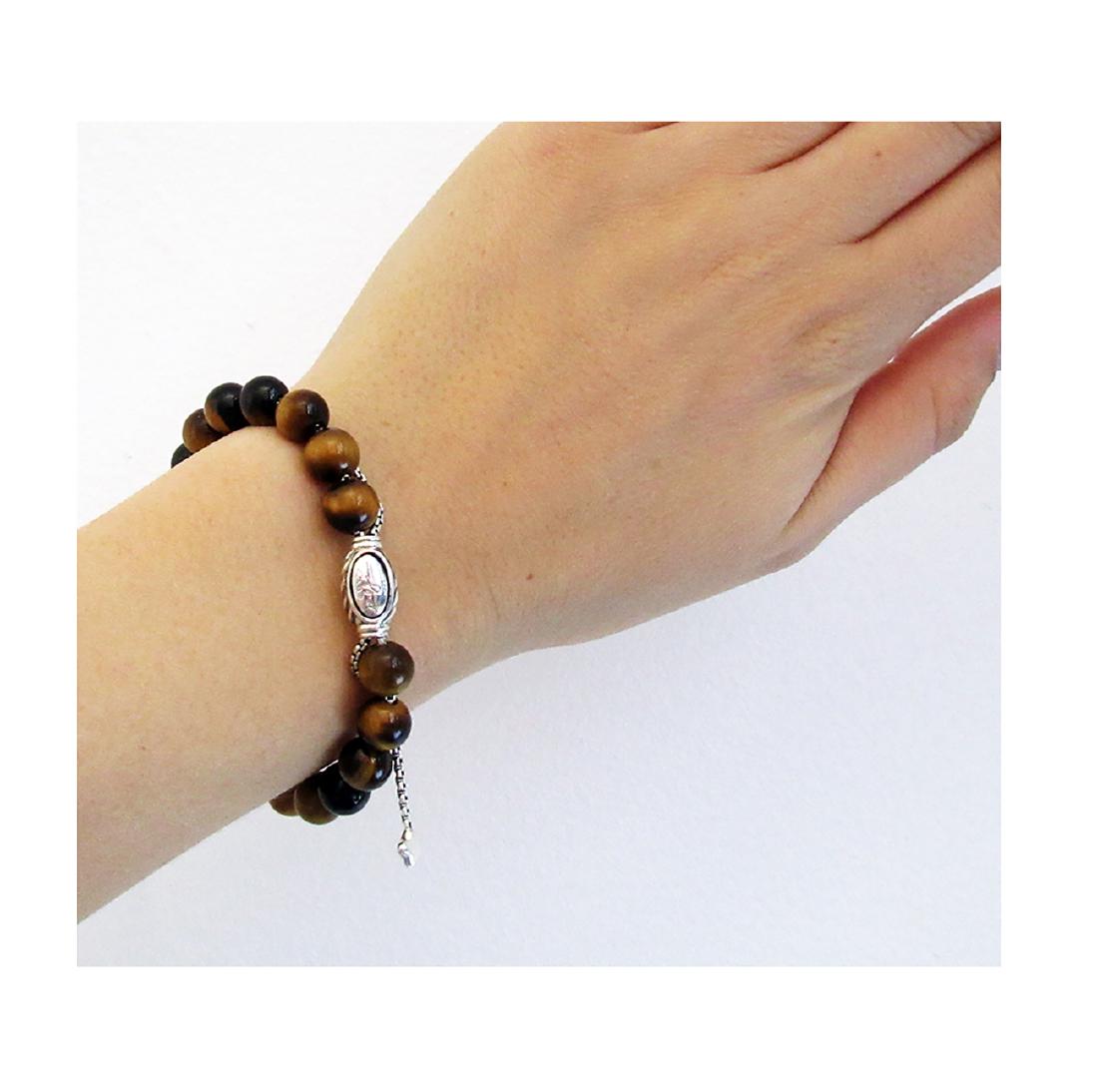 David Yurman 925 Sterling Silver Spiritual Tiger Eye: David Yurman 925 Sterling Silver Spiritual Tiger Eye Beads Bracelet Retail Price: $395 Brand: David Yurman Material: 925 Sterling Silver Stones: Tiger Eye 8mm. Size: One Size Condition: Like New Comes