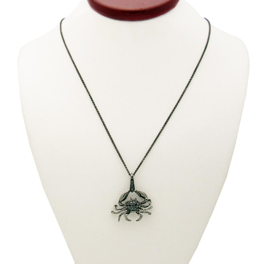 Stephen Webster 18k Darken Gold Astro Cancer Pendant: Stephen Webster 18k Darken Gold Astro Cancer Pendant Brand: Stephen Webster Metal:18k Darken Gold Gemstones: Black Onyx Length: 16" Measurements of the pendant: 16mm. x 21mm. Condition: Excellent