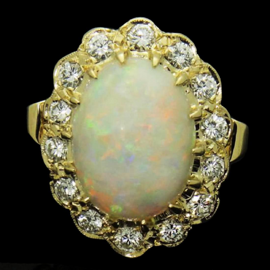 14K YELLOW GOLD 1.40CT DIAMOND VS G DIAMOND & OPAL RING: approx. 1.40 carats EXCELLENT VS CLARITY G COLOR Gem: Opal 16.40 x 12.40mm Total Item Weight: 11.7g Size: 6.25 Front design Measurements: 24.37 x 19.02mm Hallmarks, Stamps or Metal Test: 14k
