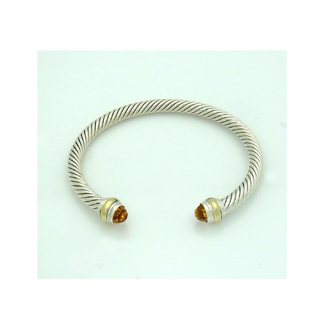 David Yurman 925 Cable Classic 5mm Bracelet with: David Yurman 925 Sterling Silver Cable Classic 5mm Bracelet with Citrine and 14K Yellow Gold Retail Price: $550 Brand: David Yurman Material: 925 Sterling Silver, 14k Yellow gold Stone: Citrine Width: