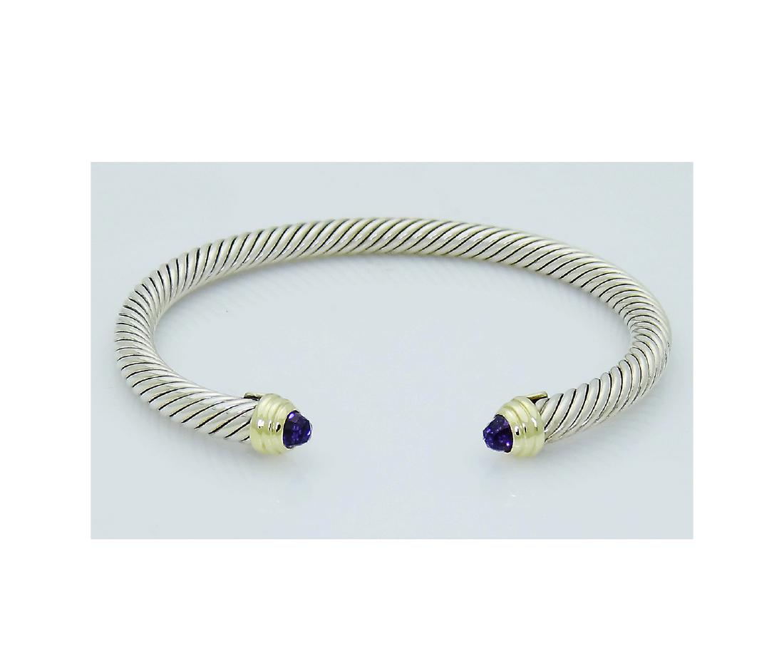 David Yurman 925 Sterling Silver&14K Gold Cable 5mm: David Yurman 925 Sterling Silver&14K Gold Cable 5mm Bracelet with Amethyst Retail Price: $550 Material: 925 Sterling Silver & 14K Yellow Gold Stones: Faceted Amethyst, Width: 5mm Size: Large Condition