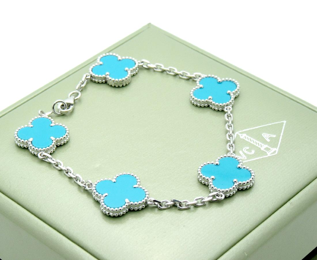 Van Cleef & Arpels 18k Gold Turquoise Alhambra Bracelet: Van Cleef & Arpels 18k White Gold Turquoise Alhambra bracelet, 5 motifs Metal: 18k white Gold Stone: Turquoise Motif Measurements: 15mm. x 15mm