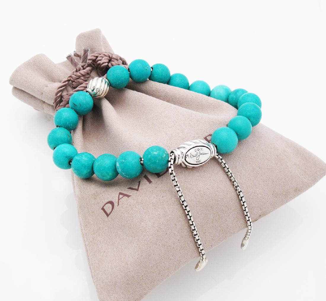 David Yurman Sterling Silver Spiritual Turquoise Silver: David Yurman Sterling Silver Spiritual Turquoise Silver Accent 8mm Beads Bracelet Metal: Sterling Silver Stone: Turquoise (8mm.) Size: Adjustable Condition: Like new Comes with DY pouch