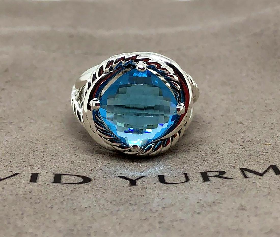 David Yurman Sterling Silver Infinity 11mm Blue Topaz: David Yurman Sterling Silver Infinity 11mm Blue Topaz Ring Sz7 Retail: $650 Metal: Sterling Silver Stone: Faceted Blue Topaz 11mm. Size: 7 Condition: Like new Comes with DY pouch