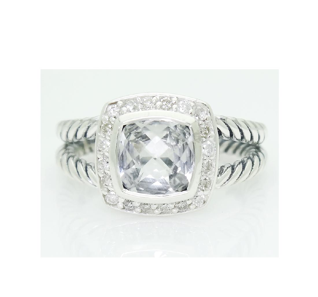 DAVID YURMAN Sterling Silver White Topaz and Diamond: Brand: David Yurman Material: 925 Sterling Silver Stone: Faceted White Topaz7mm. Diamond: 0.17TCW .Size: 6.5 Condition: Like New Comes with DY pouch