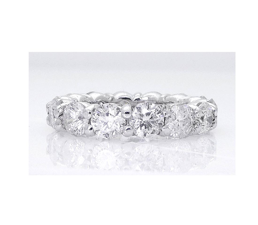 14k White Gold 4.20TCW Round Brilliant Diamond Eternity: 14k White Gold 4.20 TCW Round Brilliant Diamond Eternity Wedding Band Ring Stones: 14 Round Brilliant Diamonds Totaling Apx. 4.20 TCW I1 Clarity H-I ColorSize: 5.75Weight: 5.4 gramsMeasurements: 4mm W