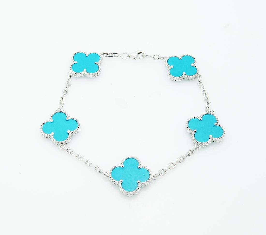 Van Cleef & Arpels 18k Gold Turquoise Alhambra Bracelet: Van Cleef & Arpels 18k White Gold Turquoise Alhambra bracelet, 5 motifs Metal: 18k white Gold Stone: Turquoise Motif Measurements: 15mm. x 15mm