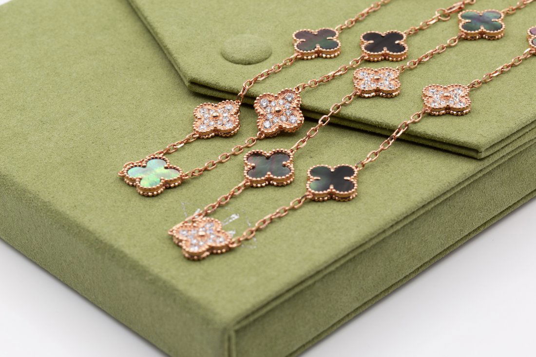 VAN CLEEF & ARPELS VINTAGE ALHAMBRA NECKLACE 20 MOTIF: VAN CLEEF & ARPELS VINTAGE ALHAMBRA LONG NECKLACE 20 MOTIF Van Cleef& Arpels Vintage Alhambra long necklace, 20 motifsPink gold, Mother-of-pearl, DiamondRetail: $57,000.0