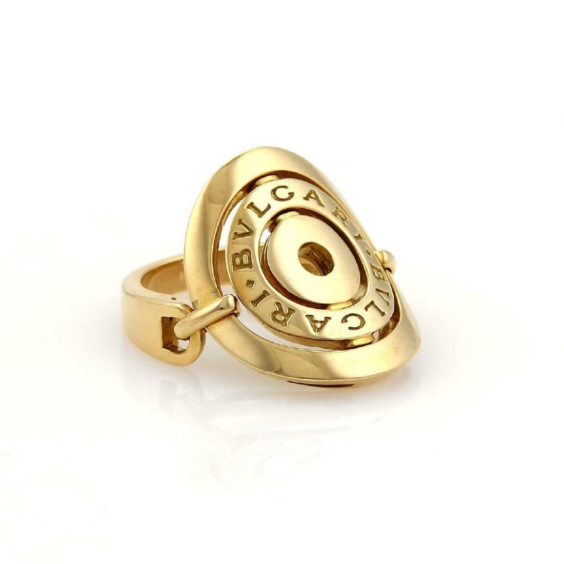 Bulgari Astrale Cerchi 18k Contour Flex Top Ring Size 5: Bvlgari Bulgari Astrale Cerchi 18k YellowGold Contour Flex Top Ring Size 5 Astrale Cerchi collection, it is crafted from 18k yellow gold with a fine polished finish featuring three circles, the center