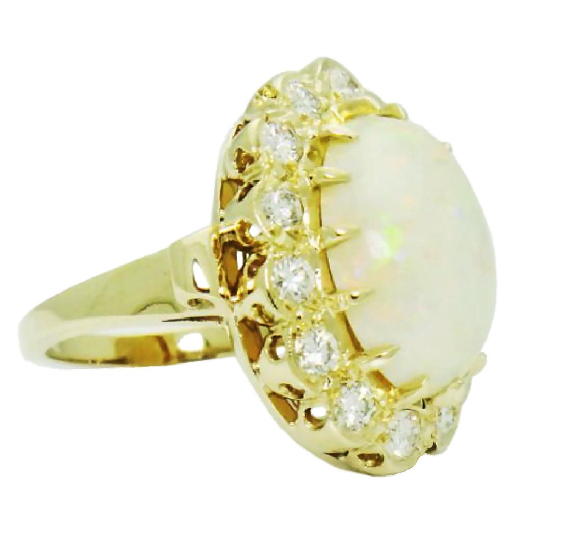 14K YELLOW GOLD 1.40CT DIAMOND VS G DIAMOND & OPAL RING: approx. 1.40 carats EXCELLENT VS CLARITY G COLOR Gem: Opal 16.40 x 12.40mm Total Item Weight: 11.7g Size: 6.25 Front design Measurements: 24.37 x 19.02mm Hallmarks, Stamps or Metal Test: 14k