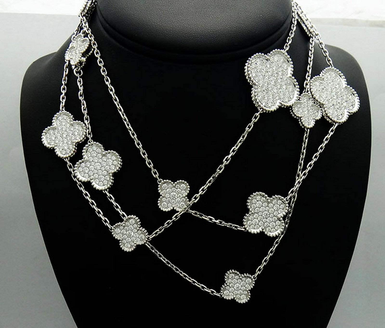 Van Cleef & Arpels 18K Diamond Magic Alhambra Necklace: Van Cleef & Arpels 18K White Gold Diamond Magic Alhambra 16 motifs Long NecklaceMetal 18K White GoldDiamonds: 488 stones, 16.92 caratsMotifs: 26 mm x 20 mm 15 mmLength: 47.28 inchesWeight: 78.4gRetail