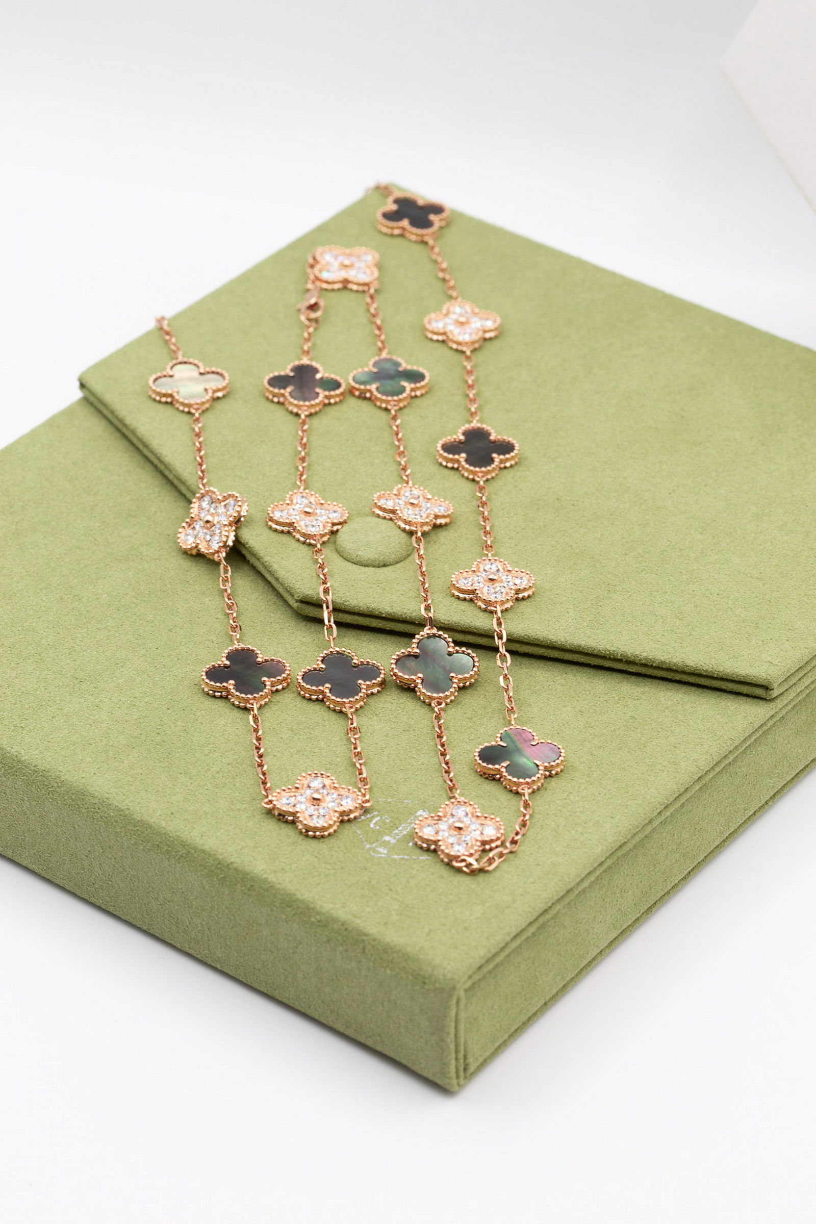 VAN CLEEF & ARPELS VINTAGE ALHAMBRA 20 MOTIF NECKLACE: VAN CLEEF& ARPELS VINTAGE ALHAMBRA LONG NECKLACE, 20 MOTIFS18K Pink gold, Mother-of-pearl, Diamond Retail: $57,000.00