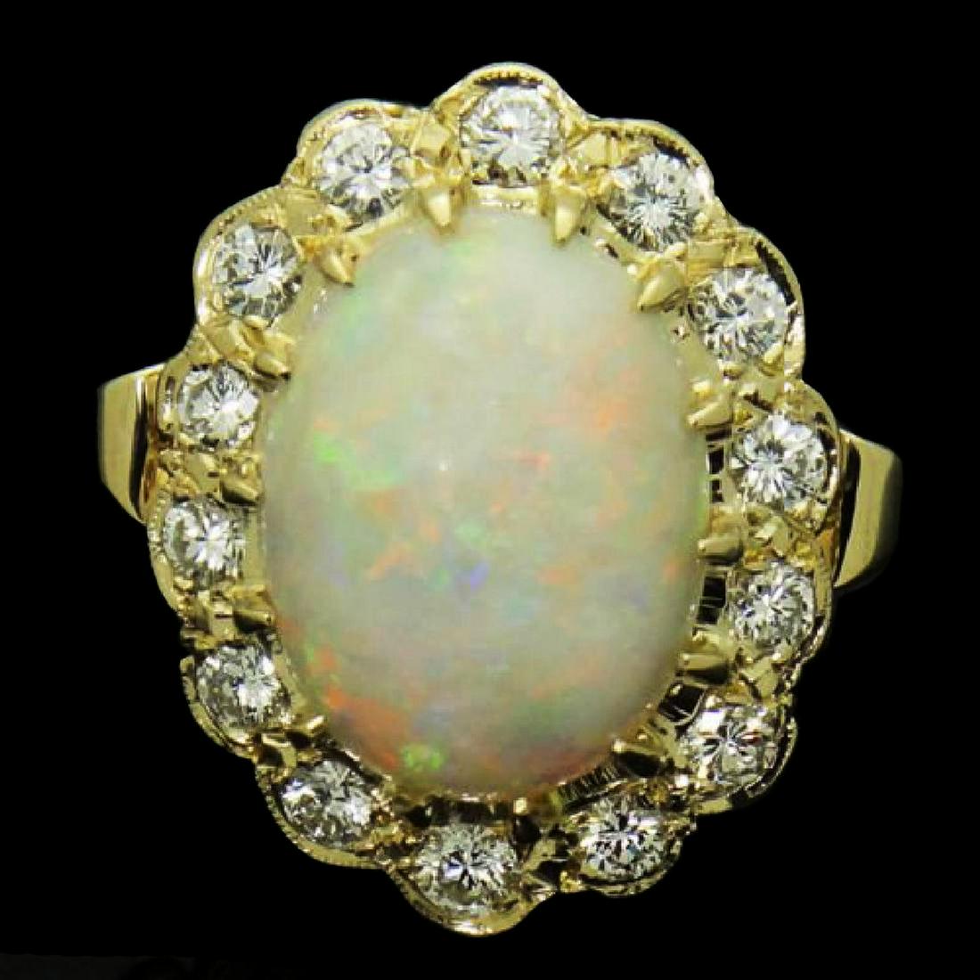 14K YELLOW GOLD 1.40CT DIAMOND VS G DIAMOND & OPAL RING: approx. 1.40 carats EXCELLENT VS CLARITY G COLOR Gem: Opal 16.40 x 12.40mm Total Item Weight: 11.7g Size: 6.25 Front design Measurements: 24.37 x 19.02mm Hallmarks, Stamps or Metal Test: 14k