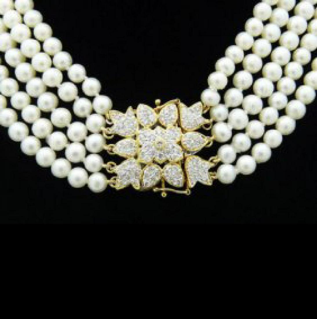 4 Row Pearls 1.13 Carat Diamond Necklace Tulip Clasp: 4 Row Pearl & 1.13 carats Diamond Choker Necklace 18k Yellow Gold Tulip Clasp 15.5” long:Stones & Gems: 1.13 carats Round cut Diamonds and Pearls approx. 4.51mm: Total Item Weight: 68g (2.39oz): Mea