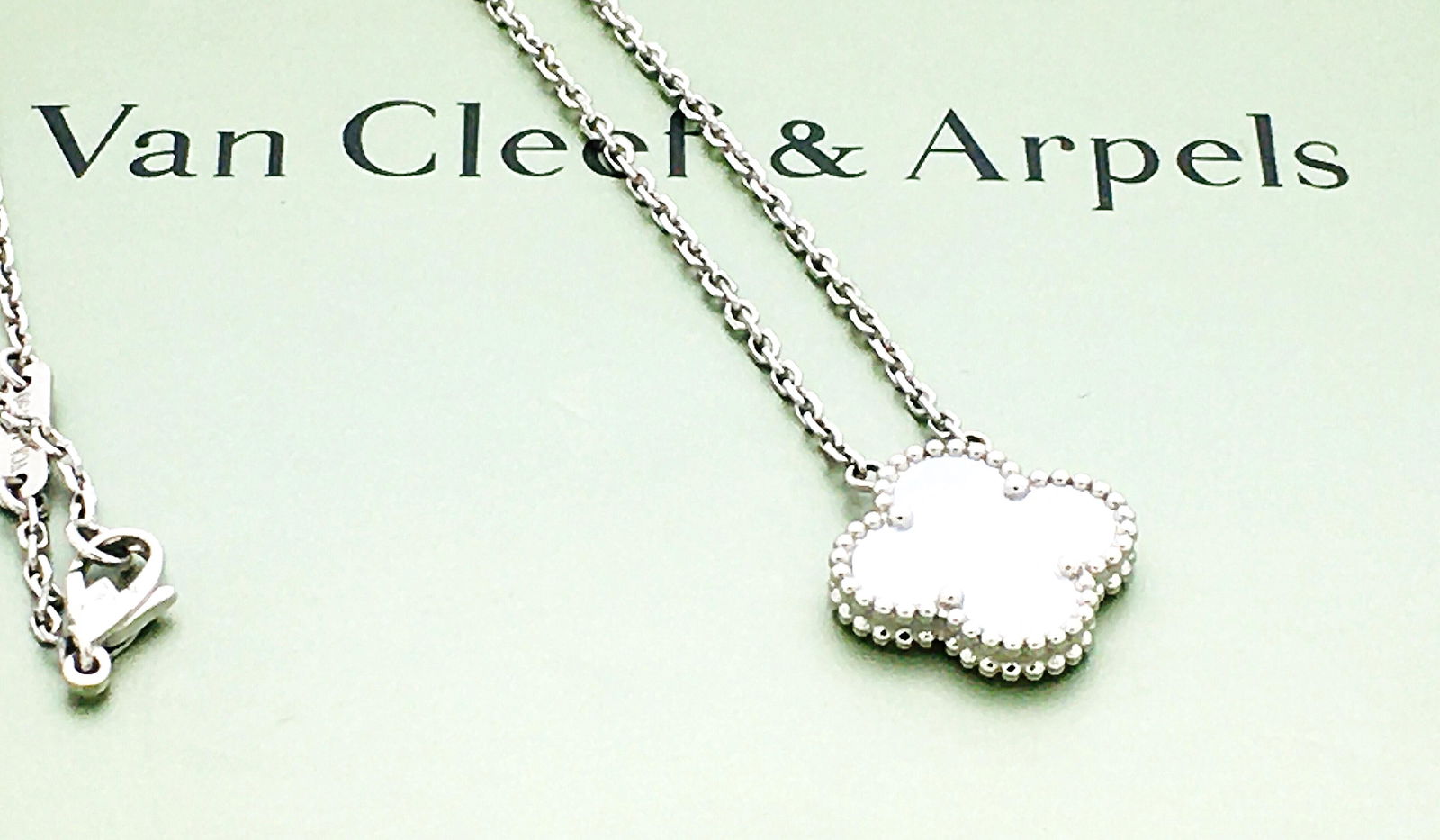 Van Cleef & Arpels 18k Vintage Alhambra PendantNecklace: Van Cleef & Arpels 18k White Gold Vintage Alhambra Pendant NecklaceMother Of PearlBRAND : Van Cleef & ArpelsCOLLECTION: Vintage AlhambraSTONES: 1 Mother Of PearlSIZE: 16.8"CONDITION: Excellent Like Ne