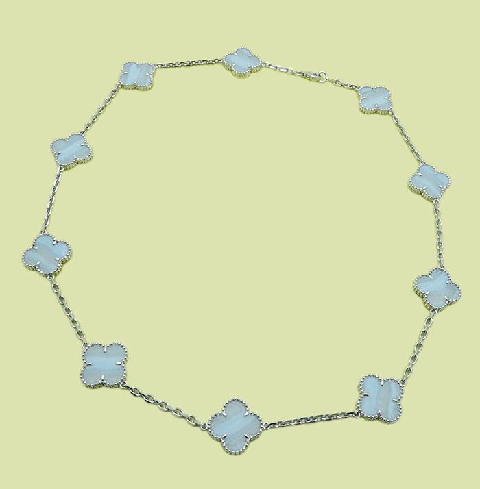 Vintage Van Cleef & Arpels Alhambra 18K Chalcedony 10: Vintage Van Cleef & Arpels Alhambra 18K White Gold Chalcedony 10 motifs Necklace Metal: White Gold Stones: Chalcedony Motifs: 10 Length: 16 inches Motif Measurements: 14 mm x 14mm Weight: 19.7 g
