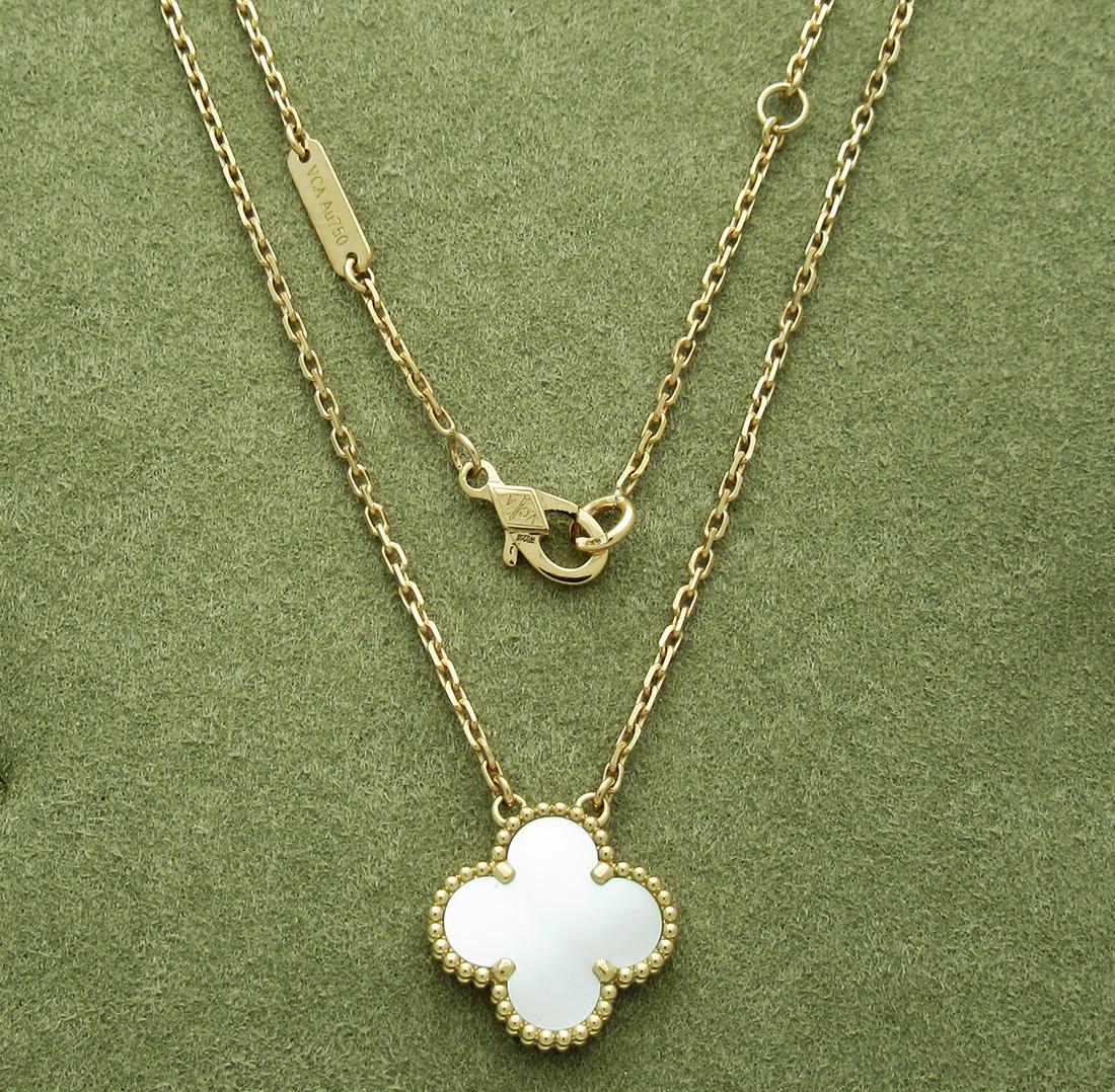 Van Cleef & Arpels Magic Alhambra Mother of Pearl: Van Cleef & Arpels Magic Alhambra Mother of Pearl necklace, 1 motif Metal: 18k Yellow Gold Stone: Mother of Pearl Motif measurements: 15mm. x 15mm. Chain length: 16". Condition: Very Good pre-owned.