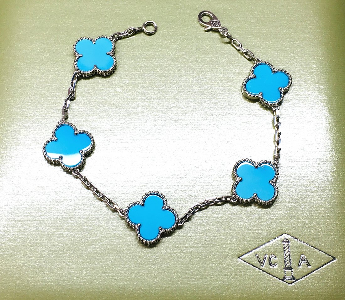 Van Cleef & Arpels 18k Gold Turquoise Alhambra Bracelet: Van Cleef & Arpels 18k White Gold Turquoise Alhambra bracelet, 5 motifs Metal: 18k white Gold Stone: Turquoise Motif Measurements: 15mm. x 15mm